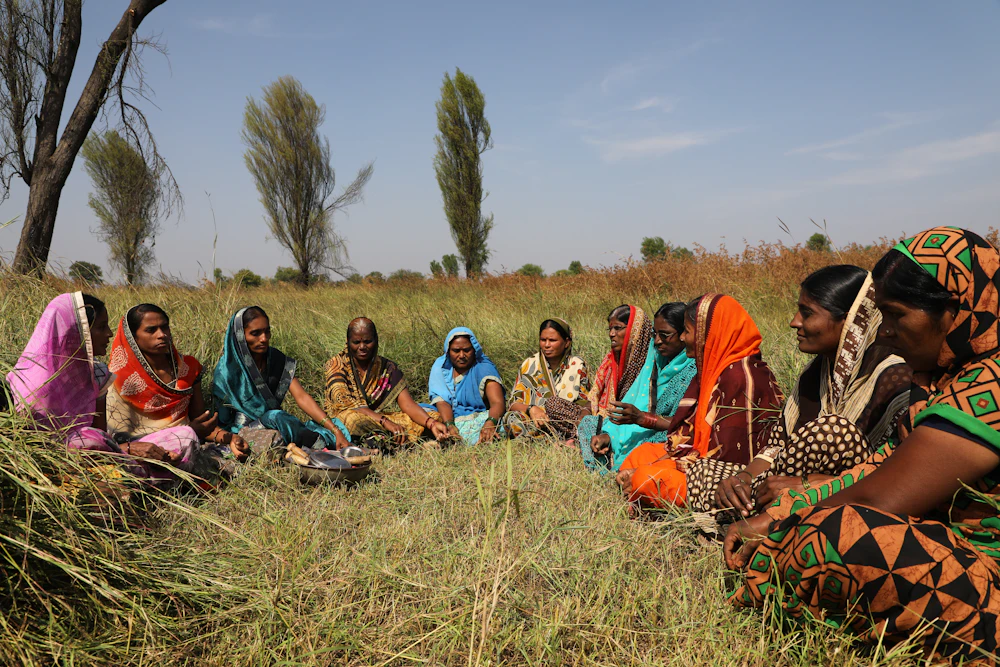 Women meeting together in a village field