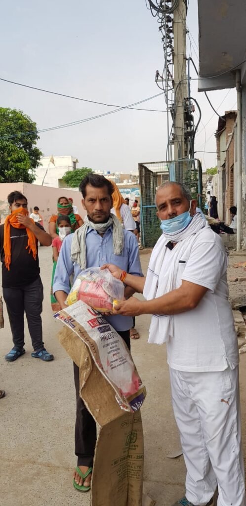 A ration kit handed to a family
